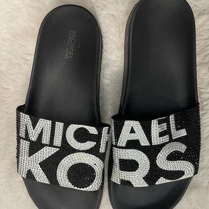 MK black sparkly slides